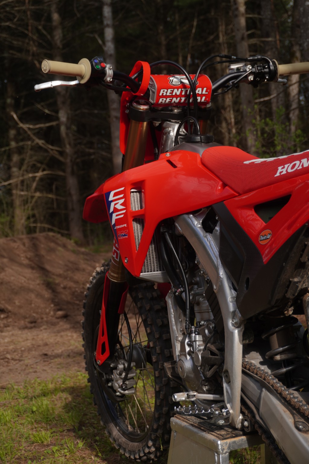 Close-up photo of a red Honda dirt bike