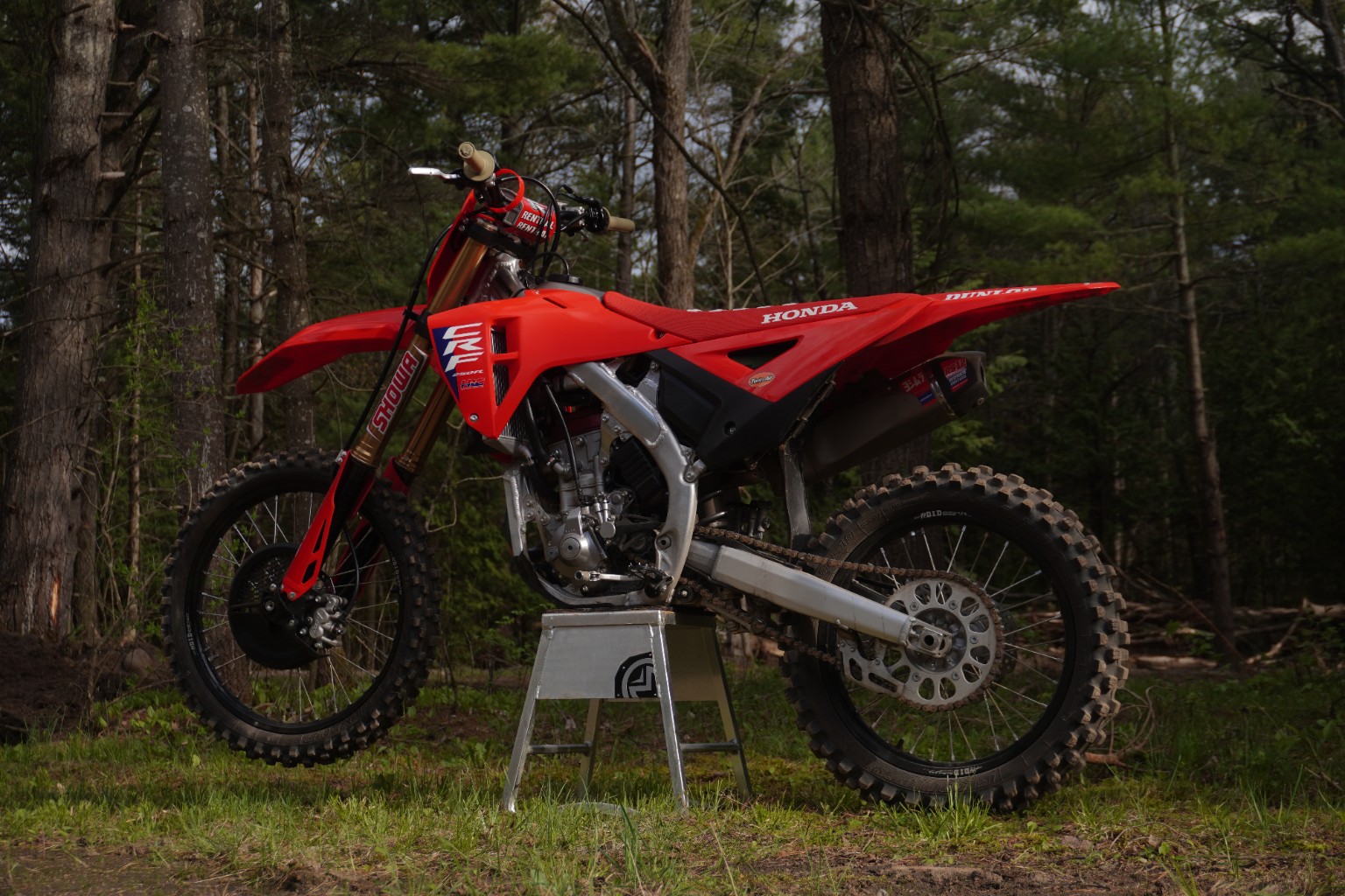 Red Honda dirt bike side profile