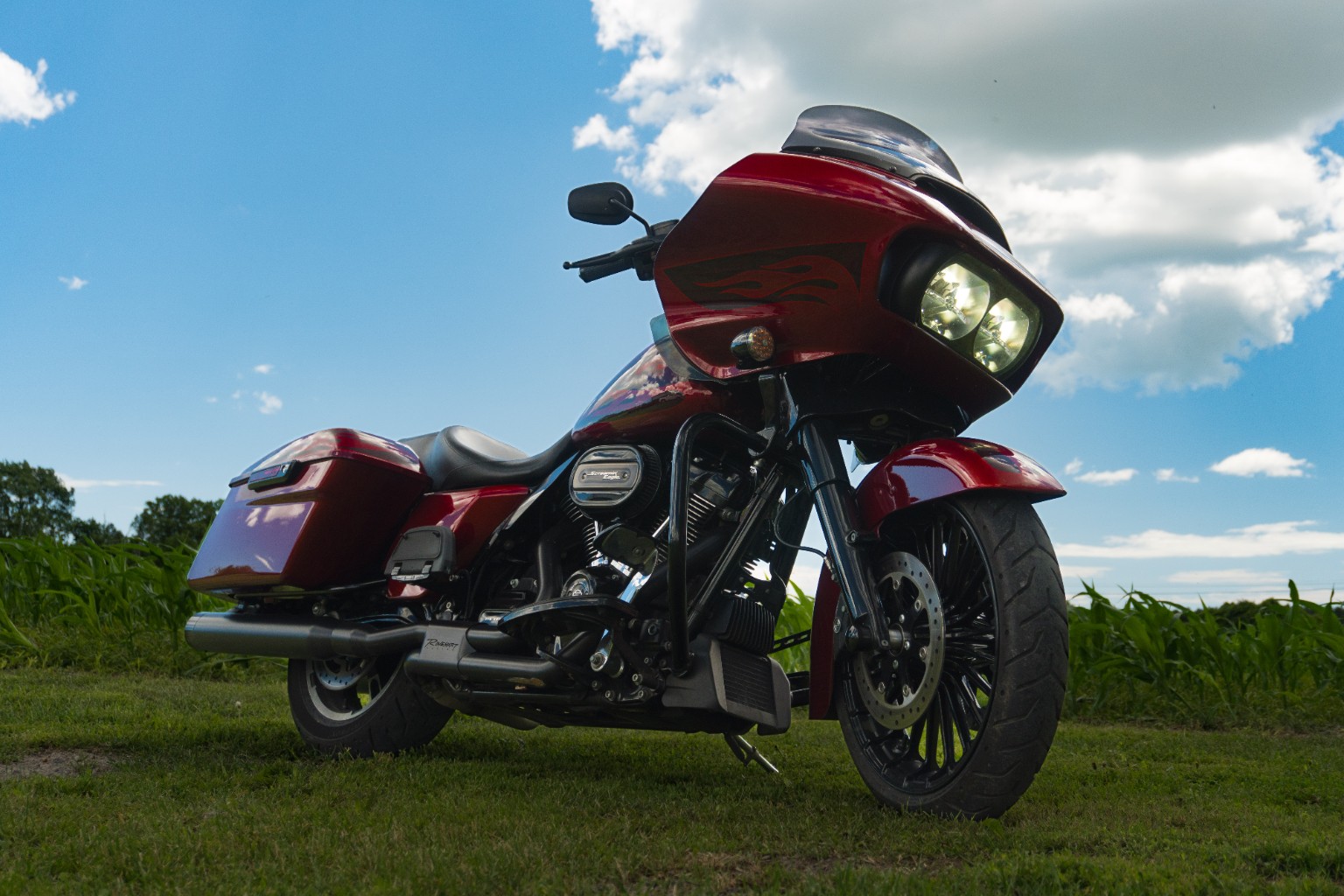 Red Harley motorcycle low angle photo